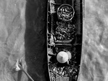  Boat with vegetables in the Mekong Delta in Vietnam, black and white