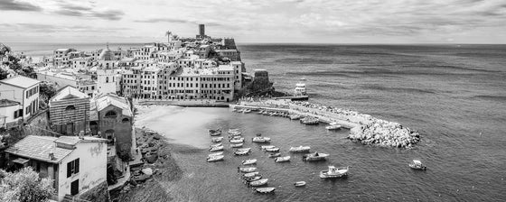 Black and white panoramic aerial photo of Vernazza, in the Cinque Terre of Italy