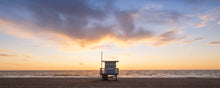  Sunset on the beach with a Los Angeles lifeguard tower.