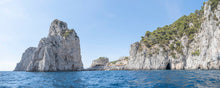  Panoramic photo of Capri, looking from the sea toward Faraglioni and Da Luigi club and restaurant