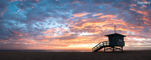  A panoramic photo of a lifeguard tower in Hermosa Beach / Manhattan Beach (Los Angeles California) at sunset.