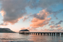  A photograph of Hanalei pier on Kauai during sunset