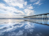 Sunset, Hermosa Beach Pier, blue skies with clouds reflecting on the sand