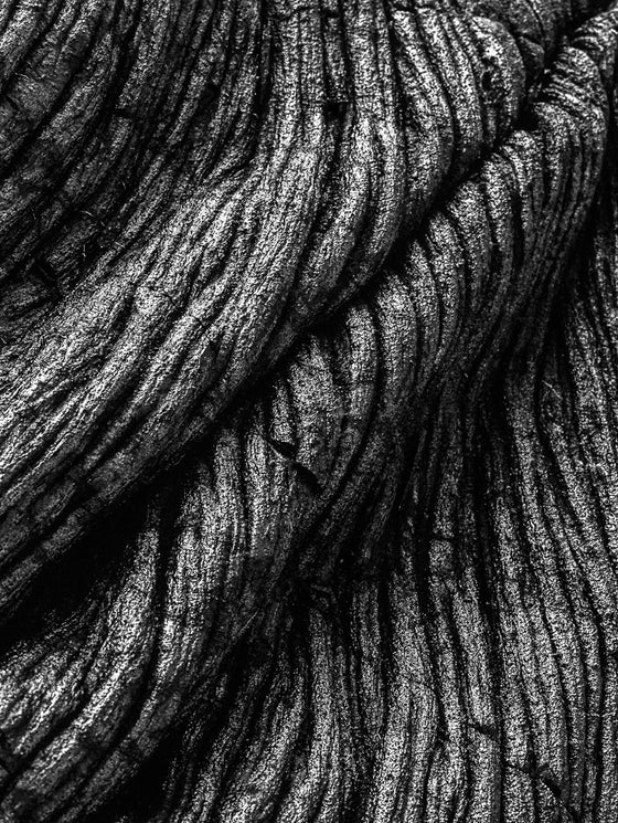 Black and white abstract photo of lava in Hawaii