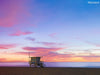 A  photo of a lifeguard tower in Manhattan Beach (Los Angeles California) at sunset.