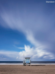  A photo of a lifeguard tower in Manhattan Beach (Los Angeles California) with dramatic clouds overhead