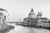 Black and white photo of the Grand Canal and the Basilica di Santa Maria della Salute, in Venice Italy