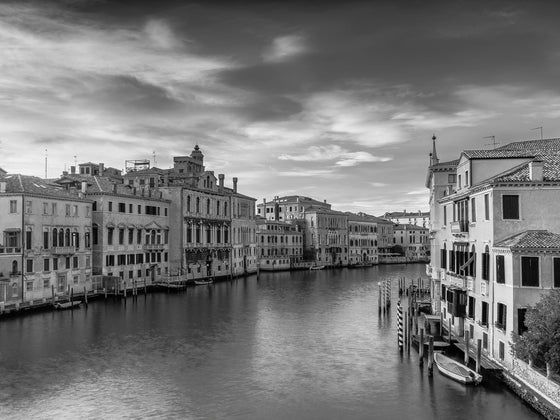 Black and white photo of sunset over the grand canal in Venice Italy