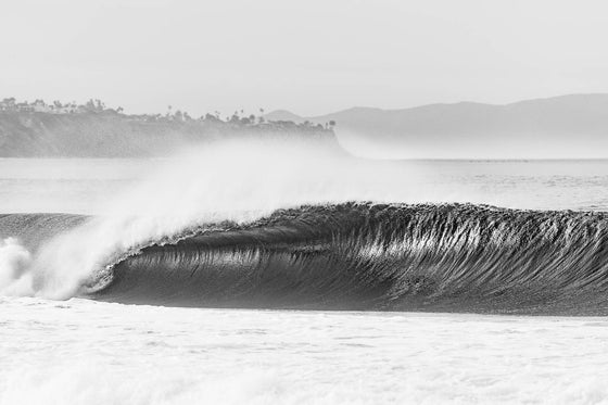 Abstract Manhattan Beach California wave photo, big swell, barrel, with Catalina and Palos Verdes in the background, black and white