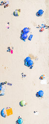Vertical panoramic color aerial photo of Manhattan Beach in Los Angeles with blue beach umbrellas