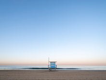  A soft blue photo of a lifeguard tower in Hermosa Beach / Manhattan Beach (Los Angeles California) at sunrise.