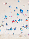 Color aerial photo of Manhattan Beach in Los Angeles with beach umbrellas