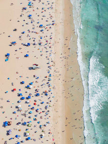  Color aerial photo of Manhattan Beach in Los Angeles with beach umbrellas, a lifeguard tower and the ocean