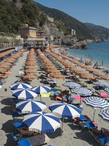  Monterosso beach  in Italy looking East with colorful umbrellas