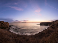  Sunset over a cove, from the cliffs of Palos Verdes California, with the Pacific Ocean and Catalina Island in the distance