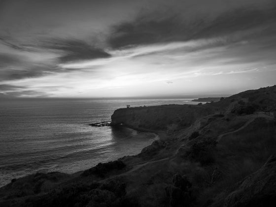 Palos Verdes California, with cliffs and the Pacific Ocean, at sunset, in black and white